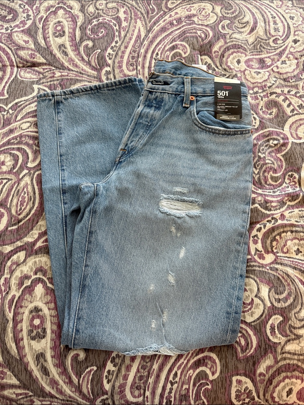 Levi's Women's Straight Jeans in Light Blue with Distressed Detail